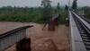 Raging flood waters wash away massive rail bridge in Odisha's Rayagada - WATCH