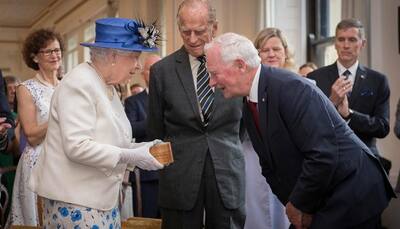 No touching: Canadian Governor-General breaks protocol with hand on Queen Elizabeth