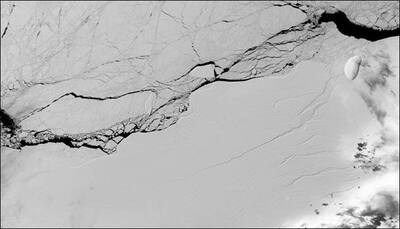 Trillion tonne iceberg that broke off the Larsen C ice shelf is drifting out to sea; new cracks spotted!