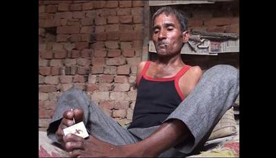 Inspirational: Born without hands, 45-year-old Haryana tailor sews clothes with his feet!