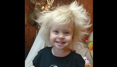 Meet this two-and-a-half year old girl with Albert Einstein hair!