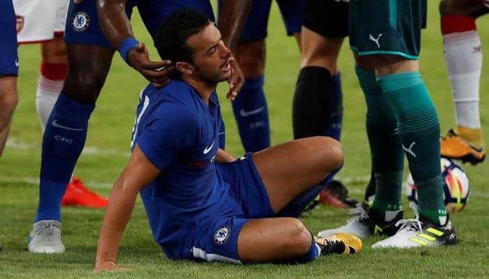 WATCH: Chelsea playmaker Pedro suffers concussion after horrible collision with Arsenal goalie David Ospina