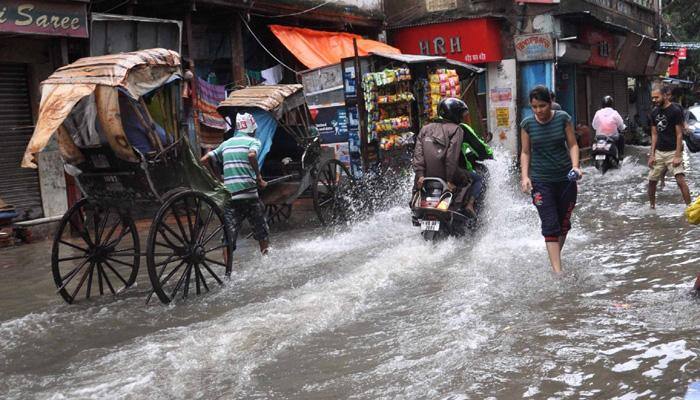 Rain, high tide batter West Bengal