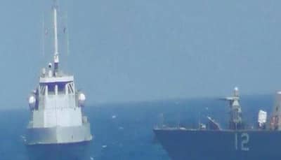 US Navy ship fires warning shots at Iranian boat