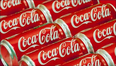 Coca-Cola profit drops 60% on refranchising charge