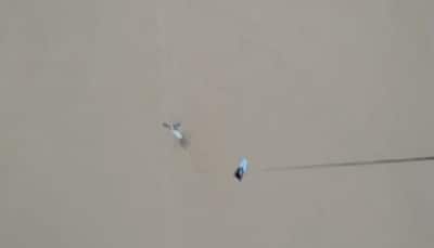 Gujarat floods: This is how IAF helicopter rescued a man clinging to electric pole – Watch video
