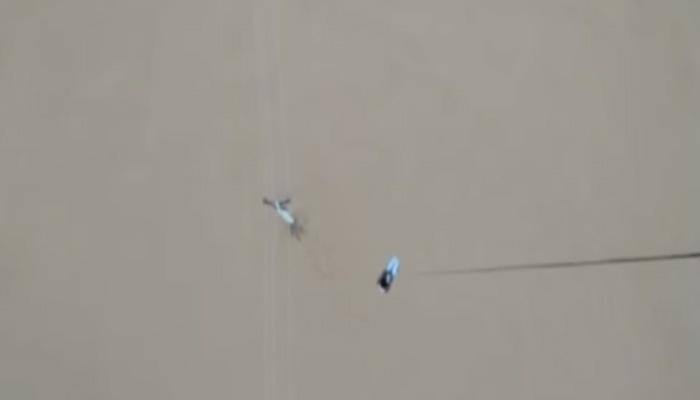 Gujarat floods: This is how IAF helicopter rescued a man clinging to electric pole – Watch video