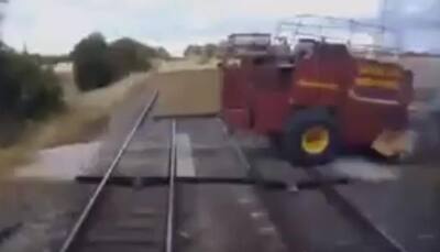 Speeding train in UK escapes collision by inches - WATCH