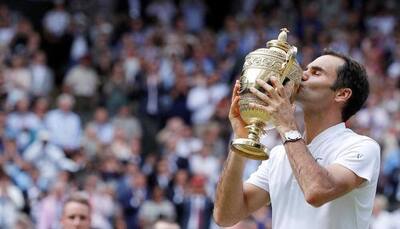 Roger Federer renames his historic eighth Wimbledon trophy 'Arthur'
