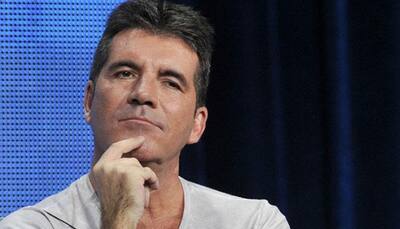 One Direction will realise the fun they had together: Simon Cowell