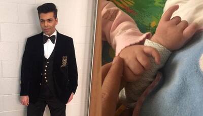 Karan Johar shares pic of his twins Yash and Roohi for the first time