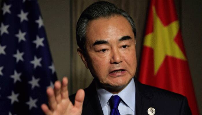China vows to enforce UN curbs on North Korea as Donald Trump praises cohesion