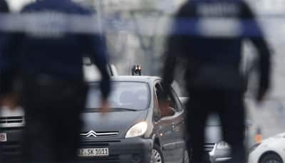 Belgian police shoot at car, call in bomb squad to Brussels' Molenbeek