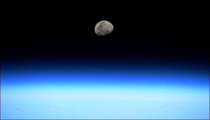 Stunner in the night sky: ISS astronaut Randy Bresnik captures the rising moon in all its glory! - See pic 