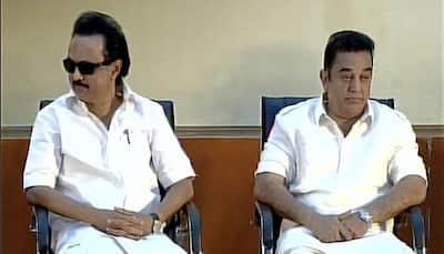 Kamal Haasan on stage, Rajinikanth in audience at DMK event