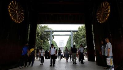 Japan Prime Minister Shinzo Abe sends ritual offering to war dead shrine on WW2 surrender anniversary