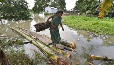 11 more deaths take Assam flood toll to 60, Governor Banwarilal Purohit meets PM Narendra Modi