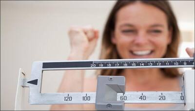Hop on to the weighing scale daily to accelerate your weight loss process!