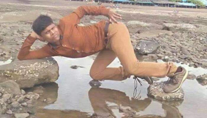 This man’s funny pose and hilarious Twitter reactions will leave you in splits