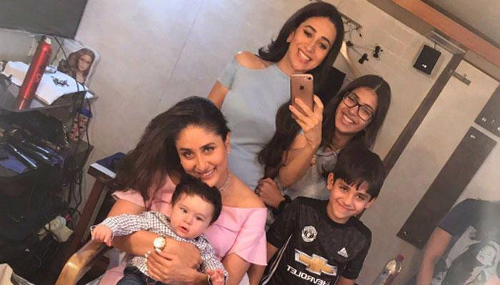 Taimur Ali Khan&#039;s latest pic with mommy Kareena and aunt Karisma is too cute to handle!