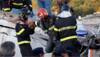 Quake kills two on Italian holiday island, young brothers saved