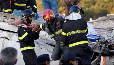 Quake kills two on Italian holiday island, young brothers saved