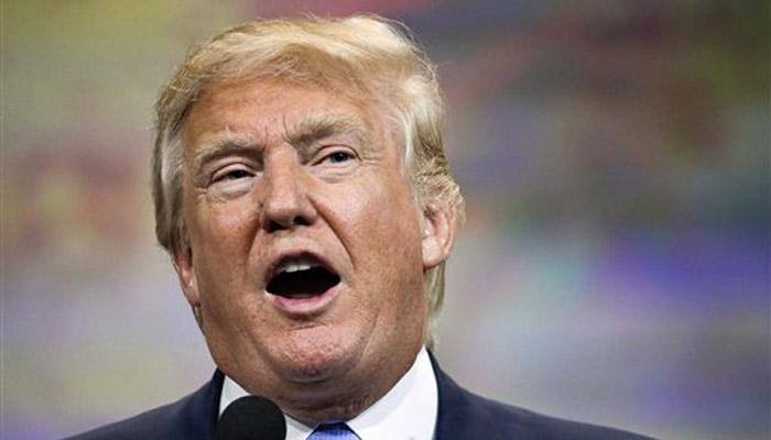 Donald Trump defends Charlottesville response, threatens shutdown for Mexico wall