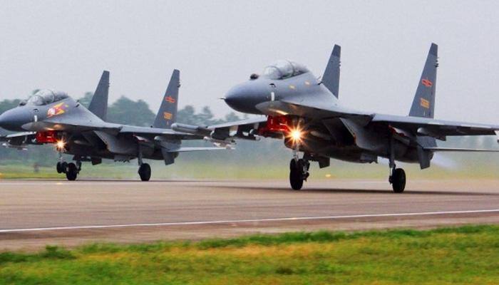 China says nothing will stop its long-range air force drills