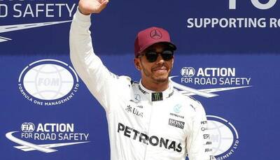 Lewis Hamilton takes pole for Belgian GP, equals Michael Schumacher's record