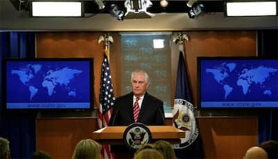 Rex Tillerson keeps distance from Donald Trump's race row stance