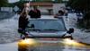 Houston residents flee Harvey floodwaters for safety at convention center