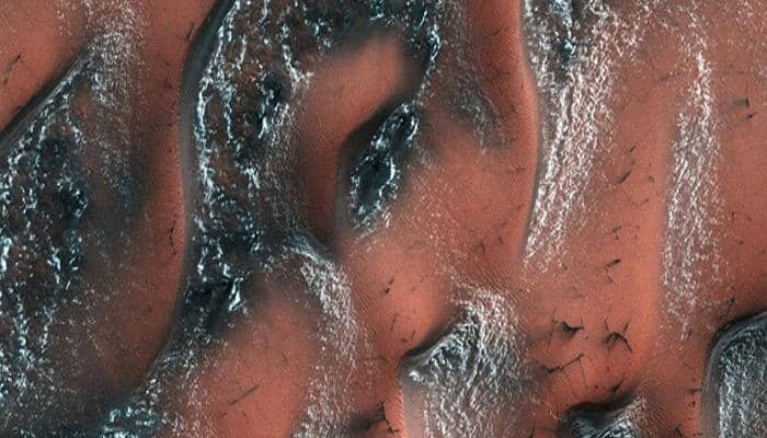 NASA unveils splendid image of snow-covered dunes on Mars