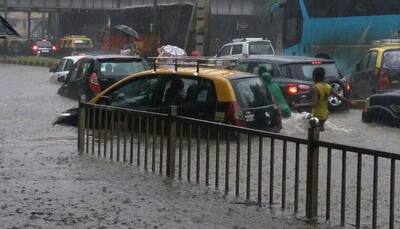 Mumbai rains - Heavy downpour derails routine life: Please be safe, say celebrities