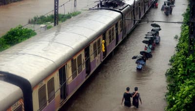 As Mumbai halts yet again, residents rush to rescue rain-affected