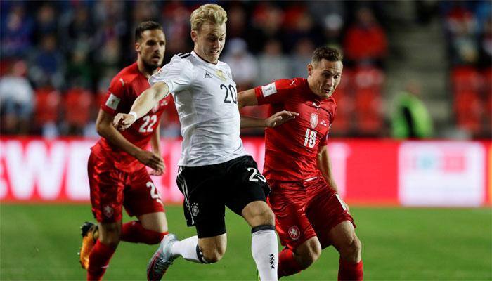 Late Mats Hummels header maintains Germany's perfect record