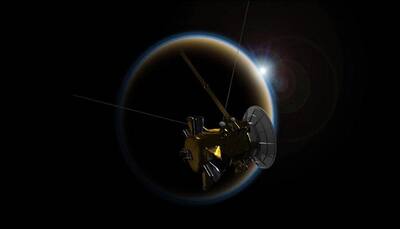 Cassini gives Titan a 'goodbye kiss' as it takes a final glimpse of Saturn's giant moon
