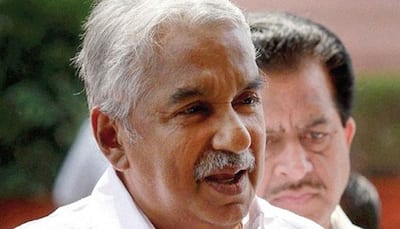 Oommen Chandy government decision to accept land tax scraped