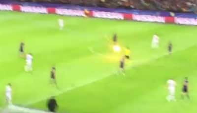 Watch: Referee narrowly escapes burning flare during Champions League match