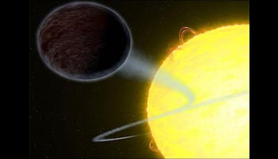NASA's Hubble spots a 'hot Jupiter-like' blistering, pitch-black exoplanet!
