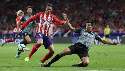 Atletico Madrid show classic grit in triumphant start to new era