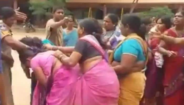 Telangana govt&#039;s free saree drive takes an ugly turn, women ask KCR to give &#039;Rs 50&#039; cloth to daughter