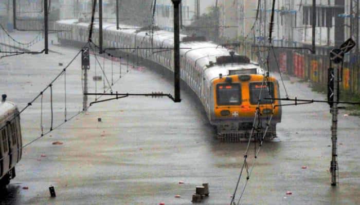Mumbai rains: Flight, train services resume; city crawls back to normalcy