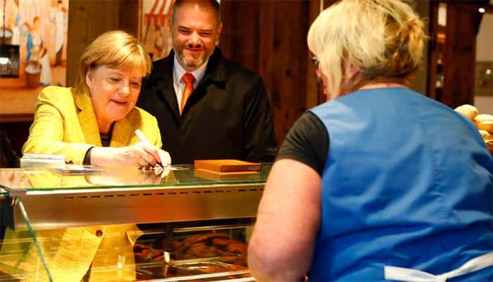 Angela Merkel, Martin Schulz urge undecided Germans to vote with far right gaining