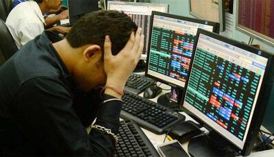 Sensex gets a scare on global headwinds, dives over 400 points; Nifty dips below 9,900-mark 