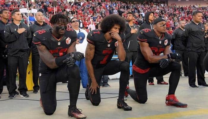 Donald Trump ramps up NFL fight, calls for ban on kneeling during anthem