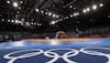 Federation suspends wrestling coach over objectionable social media post