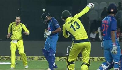 Watch: Matthew Wade hits Rohit Sharma on the head