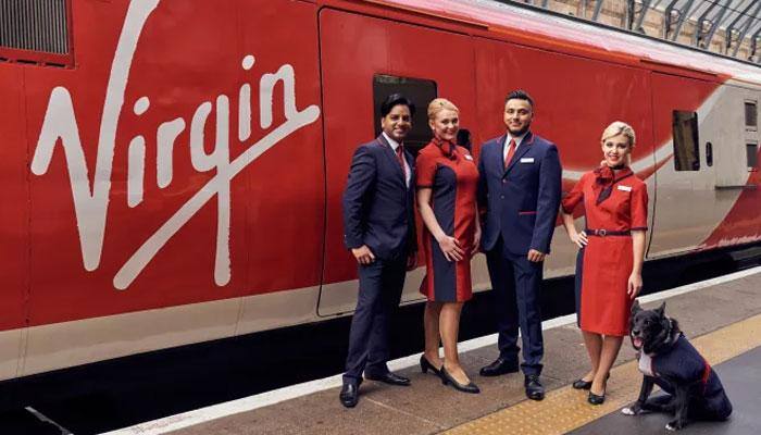 Adorable! Virgin Trains gives special uniform to dog who loves hanging around Stafford station