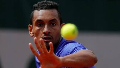 Sing-along Nick Kyrgios swaggers through in Beijing