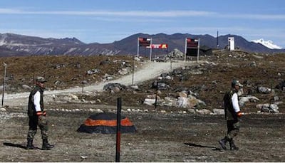 China amasses troops near Doklam, widens road